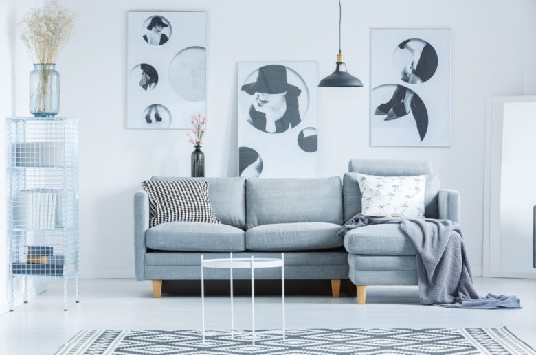 Monochromatic lobby with gray couch