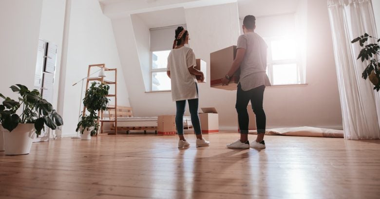 Young couple moving in new house