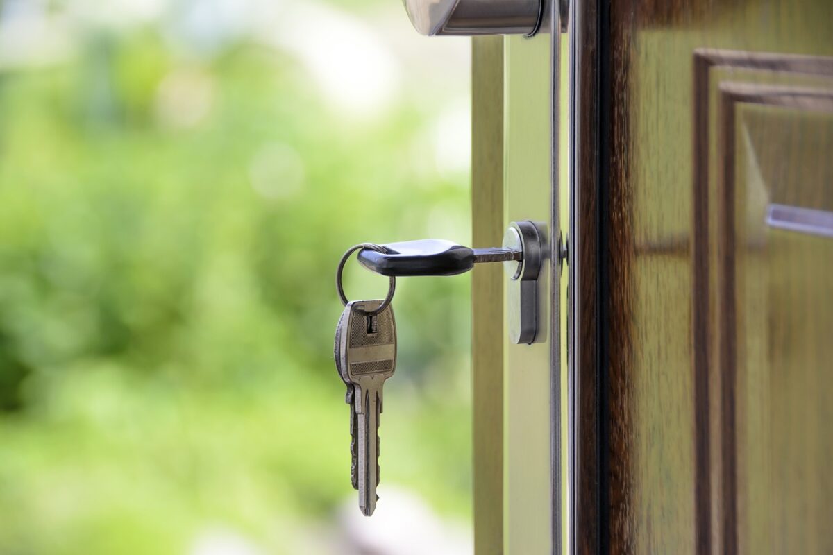 Chiave nella serratura di casa Chiave nella serratura di casa