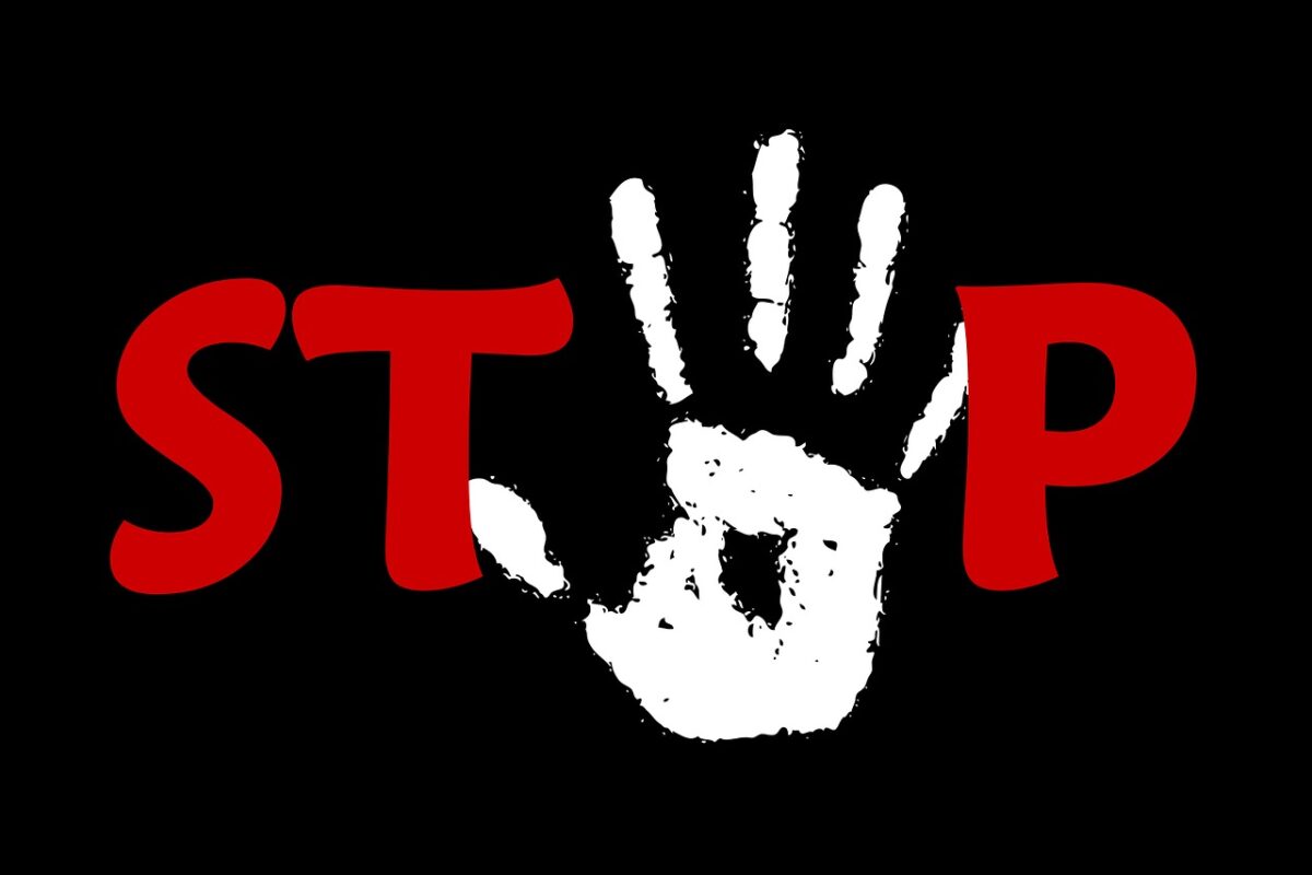 testo STOP con mano
